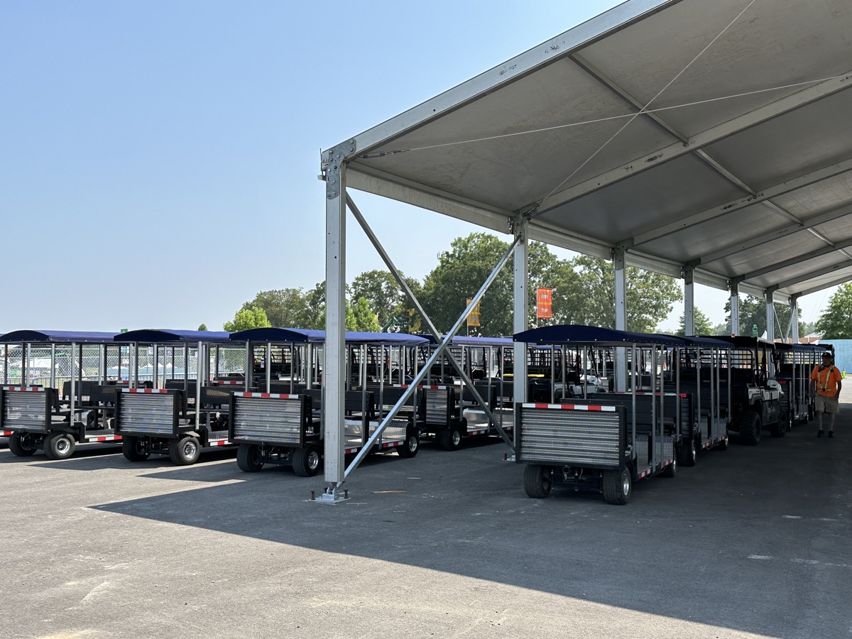 FlexTram fleet staged under tent at Bonnaroo music festival